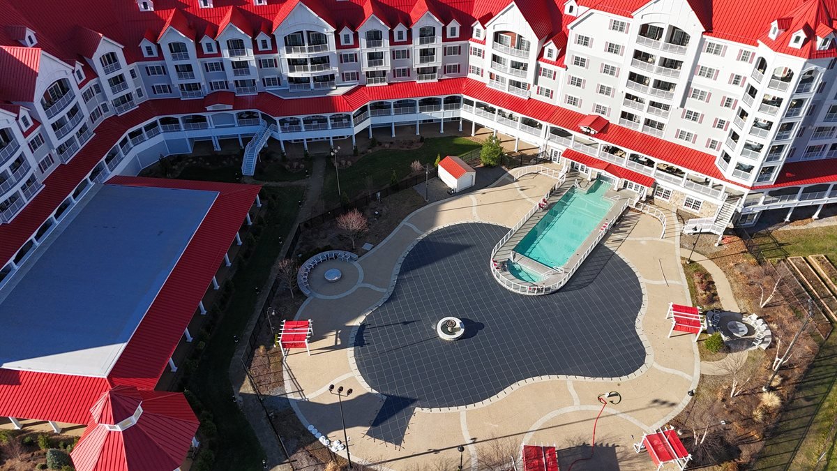 Aerial view of a closed commercial resort swimming pool